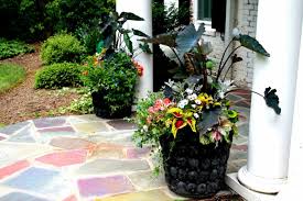 However, what if we looked at pots not just as terracotta tubs for keeping plants cooped up in, but as ornamental features in their own right? Large Planters Make The Garden Look Great