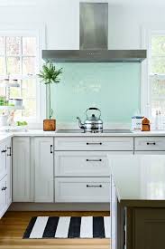 White And Bright Kitchen Seafoam Green Backsplash Black And White Striped Rug Wood Floors Lots To Love Kitchen Inspirations Fresh Kitchen Kitchen Design