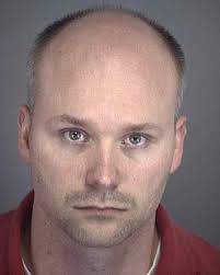 Ex-prosecutor charged with soliciting minor