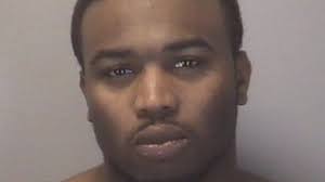 Police say shooting suspect stole gun and gold chain from victim