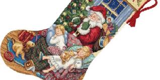 Be it a manger scene, santa holding toys, snowmen, or caroling forest animals. Cross Stitch Stocking Kits