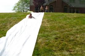 We made a slide & slide kickball course with pools! Diy Slip N Slide Genius Bob Vila