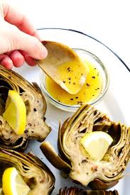 Seriously The Most Amazing Roasted Artichokes Recipe They Re Stuffed With Lots Of Garlic And Herbs Seasoned With Lots O Recipes Roasted Artichoke Recipe Food