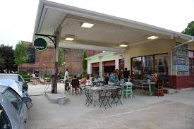 Fill Up At These Converted Gas Station Restaurants Garage Bar Dutch Colonial Homes Restaurant Station