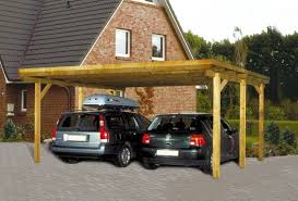 A wooden carport of this size costs around $7,200 when professionally installed over a concrete pad 1, attached to one side of a house, and with two additional walls. Wood Carports Photos Interior Design Ideas Carport Designs Building A Carport Diy Carport