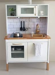 Set down the shelf and drill holes in the wall. 25 Ikea Duktig Play Kitchen Hacks Awesome Diy Makeovers