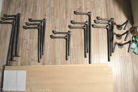 The hardest part of making this pipe bookshelf was the planning! Diy Industrial Pipe Shelves Table And Hearth