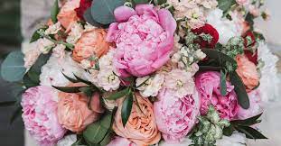 Pair peonies with roses in a bouquet for a fresh look to a traditional round design. 40 Perfect Peony Wedding Bouquets