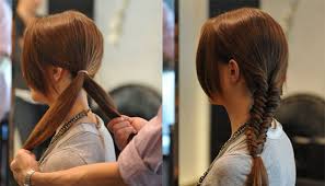 Continue taking small sections of hair and combining it with the opposite part all the way down. The Fishtail Braid Made Simple