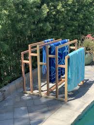 Pin By Penny Kingsbury On Basseng In 2021 Towel Rack Pool Wooden Pool Pool Float Storage