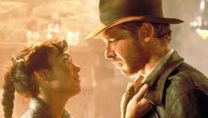 Harrison ford pretends to staple his hat to his head because it keeps blowing off for a particular scene, then they show the scene again and his hat doesn't blow off. Film Raiders Of The Lost Ark Proctors