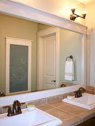 Measure mirror and select frame style determine trim style and positioning of trim around mirror to obtain measurements specific to mirror being framed. How To Frame A Mirror Hgtv