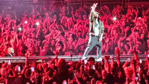 Eminem is surprise guest as he joins Jelly Roll onstage in Detroit