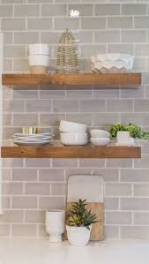 Floating Natural Wood Shelves Against A Subway Tile Backsplash Makes A Perfect Matchup For M Country Kitchen Decor Farmhouse Kitchen Backsplash Kitchen Remodel