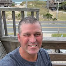 Applying Litter through a Strip Till Rig