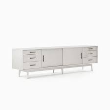 With a choice of five woods, two bases, seven pulls, and two door fronts, this versatile tv stand from room & board can be customized to complement any decor. West Elm Mid Century Media Console 96 Pebble Lazysuzy