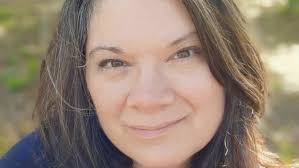 Confetti' charms with picture of Panacea family's ups and downs