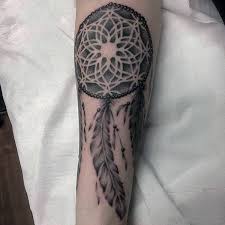 Here you can see someone has got creative with the style of webbing in the dreamcatcher again, another great example of someone embellishing their design with some cool bracelets. Simple Dream Catcher Tattoos Novocom Top
