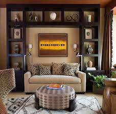 The african inspired home decorating style makes use of animal and tribal patterns to come up with a stylish, warm, and inviting. African Safari Living Room Ideas African Home Decor African Living Rooms Living Room Design Modern