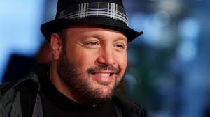 Download Actor Kevin James is smiling widely Wallpaper