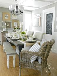 Inspiration for a coastal medium tone wood floor and brown floor dining room remodel in orange county with white walls low profile chairs beautiful arch in the back of them and a. Beach House Dining Room Roundup With Fabulous Dining Room Tables