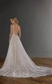 Her gorgeous wedding dresses fuse vintage details with contemporary design, making them perfect for stylish modern brides who still want something a little timeless. Spaghetti Strap V Neckline Embroidered Lace A Line Wedding Dress Kleinfeld Bridal