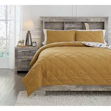 Our variety of colors and styles makes it easy to find the perfect comforter to complete your ideal guest bedroom too! Signature Design By Ashley Bedding Sets Full Cooperlen Golden Brown Quilt Set Royal Furniture Bedding Sets