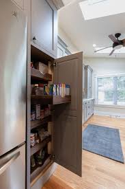 Full Height Cabinet With Walnut Pull Out Shelves Shaker Style Kitchen Cabinet Fronts In B Clever Kitchen Storage Shaker Style Kitchen Cabinets Kitchen Storage