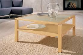 A coffee table is a low table designed to be placed in a sitting area for convenient support of beverages, remote controls, magazines, books (especially large, illustrated coffee table books), decorative objects, and other small items. Coffee Table Made Of Solid Alder Or Beech Alana Ct 10 Hulsta Luxury Furniture Mr