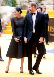 Harry And Meghan Make Their Red Carpet Debut At The Lion King Premier Meghan Markle Style Meghan Markle Prince Harry Meghan Markle Dress