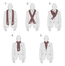 In this blog post, we cover an accessory that's made a resurgence in recent years: 7 Ways To Wear A Scarf With A Suit For Men Black Lapel