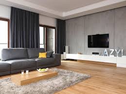 Minimalistische Fernsehwand Gestaltung Mit Weissen Lowboard Und Beton Wand Wohnzimmer Einrichten Wohnzimmer Einrichten Ideen Wohnzimmer Modern