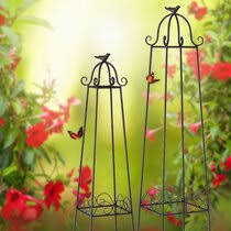 A garden trellis is an excellent way to support plants and flowers while adding structure and decorative flair to your landscape. Obelisk Rose Trellis Trellises You Ll Love In 2021 Wayfair