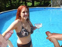 Sexy redhead in the pool getting her cup filled up - Cum Face GeneratorCum  Face Generator