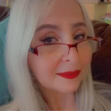 Westie mom and her puppies