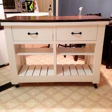The cabinets, walls and floors weren't so simple and this little kitchen island needed a new dress to fit in at the ball. Rustic Kitchen Island Diy Do It Yourself Home Projects From Ana White Kitchen Remodel Small Rustic Kitchen Island Kitchen Design