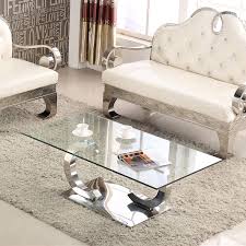 Though it has a simple shape, a parsons coffee table can be embellished with upholstery or different materials to fit many design schemes. Living Room Furniture Modern Design Glass Top Center Table Design Table With Cheap Coffee Table Buy Cheap Coffee Table Mirrored Coffee Table Coffee Table Modern Product On Alibaba Com