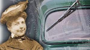 A windscreen wiper or windshield wiper is a device used to remove rain and debris from a windscreen or windshield. Men Stood In Her Way