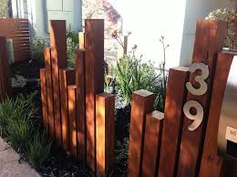 Simply pile a load of them up. Australian Railway Sleeper Projects Fence Design Privacy Fence Designs Front Garden