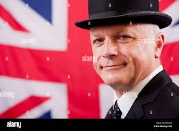Man wearing union jack hat hi-res stock photography and images