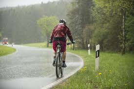 Image result for rain cyclist