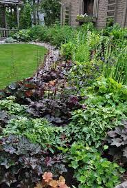Located On A Quiet Tree Lined Road Near Campbellville Ontario Is A Large Country Garden That Has Been Twe Shade Garden Backyard Landscaping Beautiful Gardens