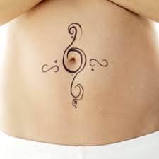 A tattoo with a tribal design. Tribal Navel Tattoo