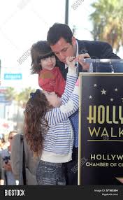 Sunny sandler is the youngest of the sandler family tree who is already racing into the footsteps laid by her father, adam sandler. Adam Sandler Sadie Image Photo Free Trial Bigstock