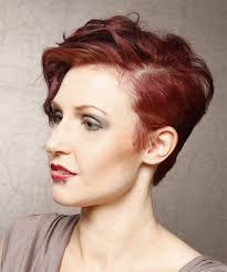 This auburn hair color ideas is ideal for fair complexions. Short Wavy Red Hairstyle With Dark Red Highlights