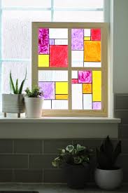 With a little tinted mod podge and glass paint, you can turn a piece of regular glass into faux stained glass. How To Make A Faux Stained Glass Window The Pretty Life Girls
