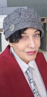 Wearing fields of flowers tunic with a wine Sami's sleeveless cardigan.