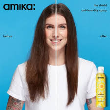 The hair spray shield 100 used by a woman 108 is on her face 110 to cover her forehead 112. The Shield Anti Humidity Spray And Heat Protectant Amika Sephora