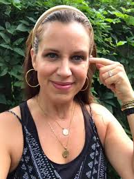 I figured out how to pull back my short hair so that I have no bangs  sticking out my coif. I took a white headband to pull back my hair and sewed