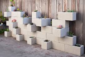 Get creative with your outdoor gardening by turning these into stenciled succulent planters! Cinderfella S Vertical Garden Planter Urban Gardens
